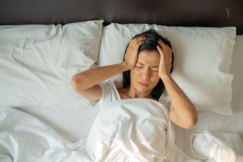 Woman having trouble sleeping.