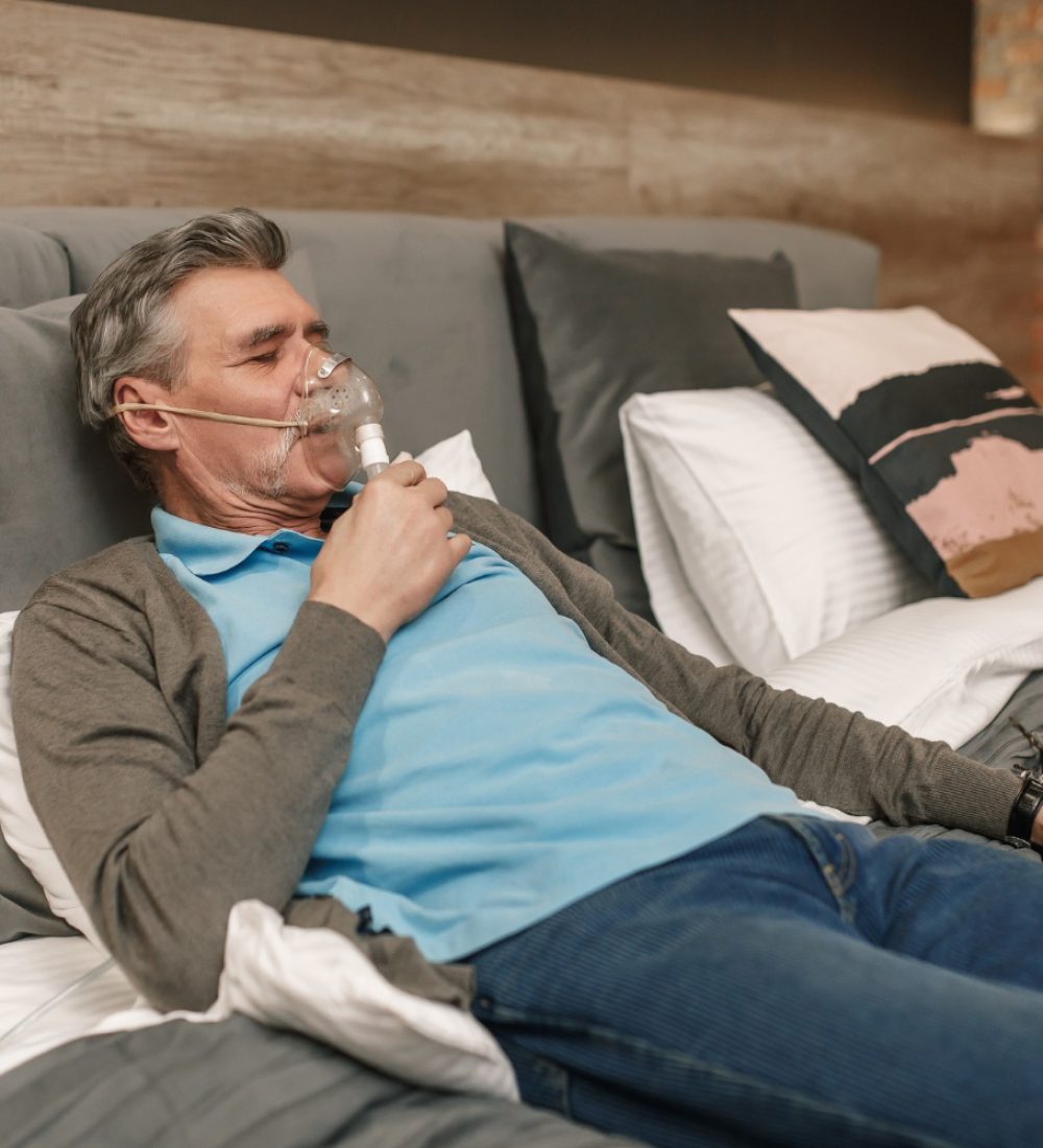 happy-healthy-senior-man-wearing-cpap-mask-sleeping-smoothly-all-night-long (1)